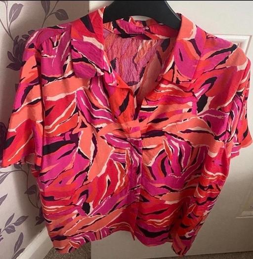  — Woman’s blouse size 16