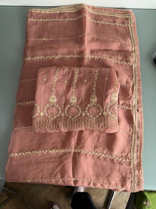  — Unstitched suit