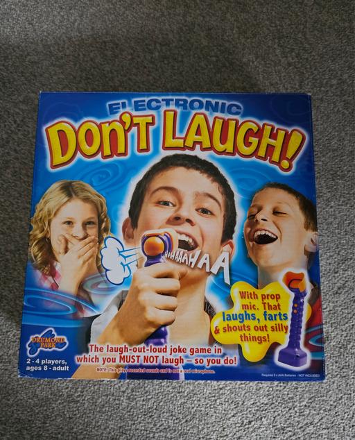  — electronic don't laugh board game