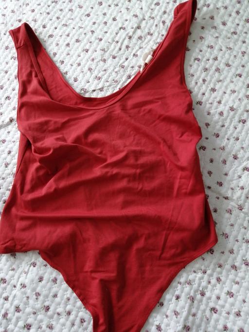  — ladies Bodysuit size *L*