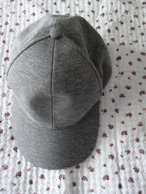  — Cap