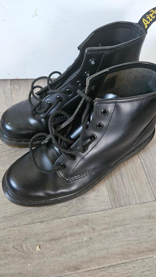  — Boots Dr Martens