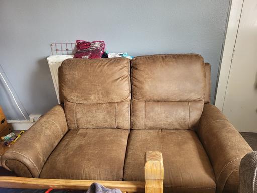  — Brown suede sofa