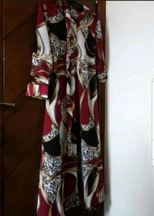  — Dress