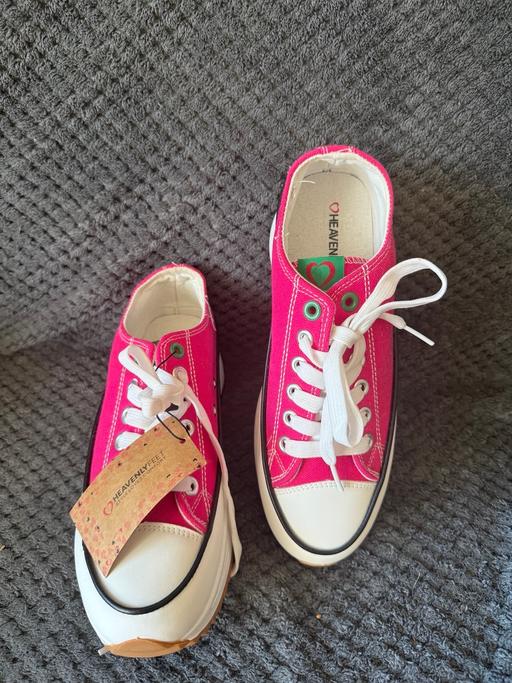  — Pink think sole foot wear.