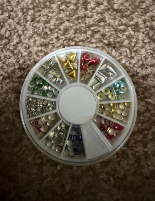  — Nails
