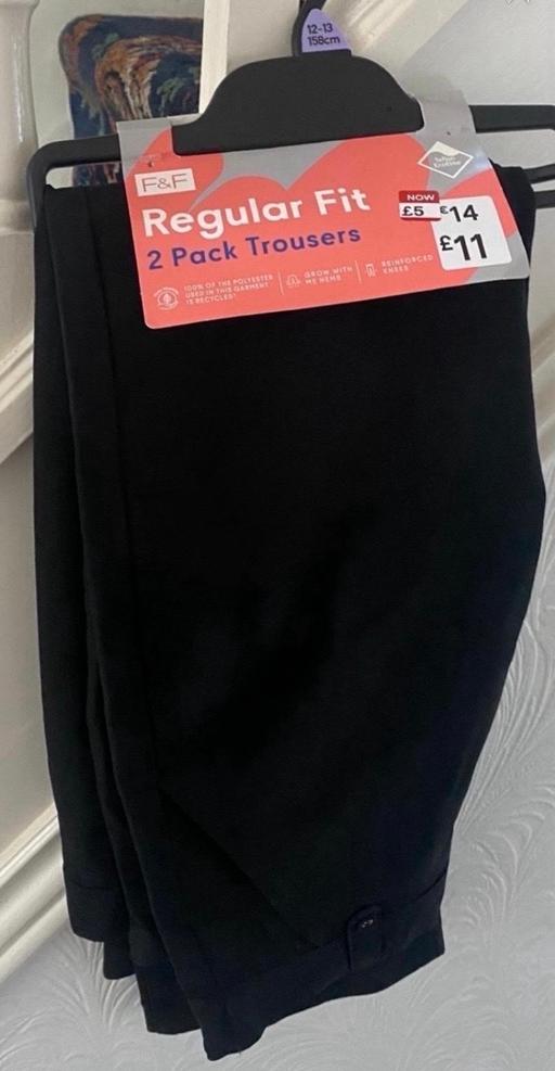  — Girls black school trousers size 12/13 years