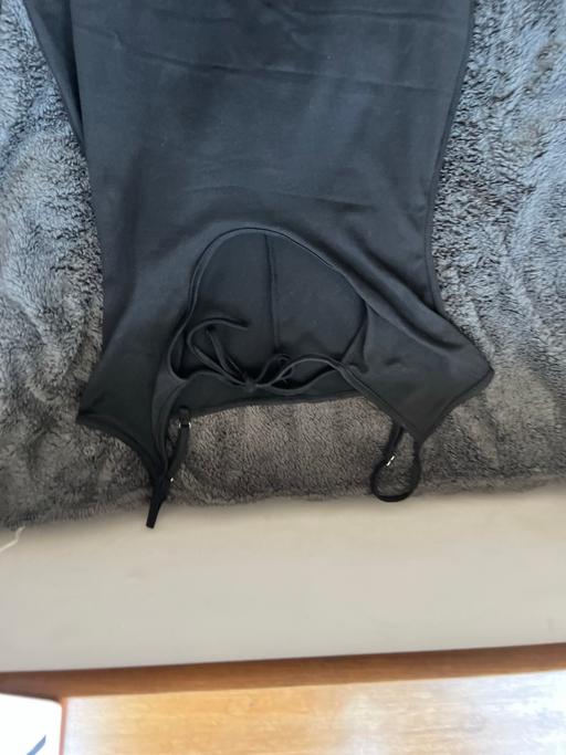  — Black open top jumpsuit
