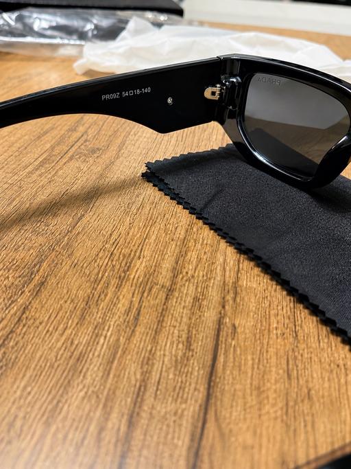 — Prada shades