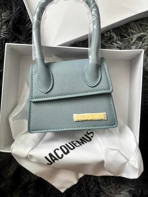  — Blue handbag