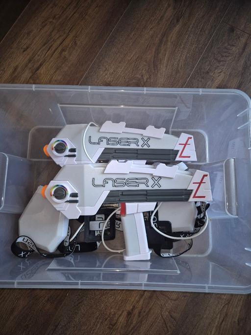  — laser guns