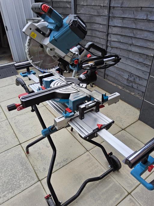  — erbauer mitresaw  and rolling stand