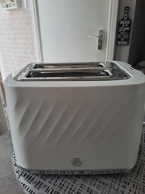  — new swan toaster