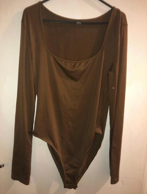  — Long sleeve bodysuit