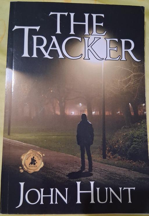  — THE TRACKER BOOK