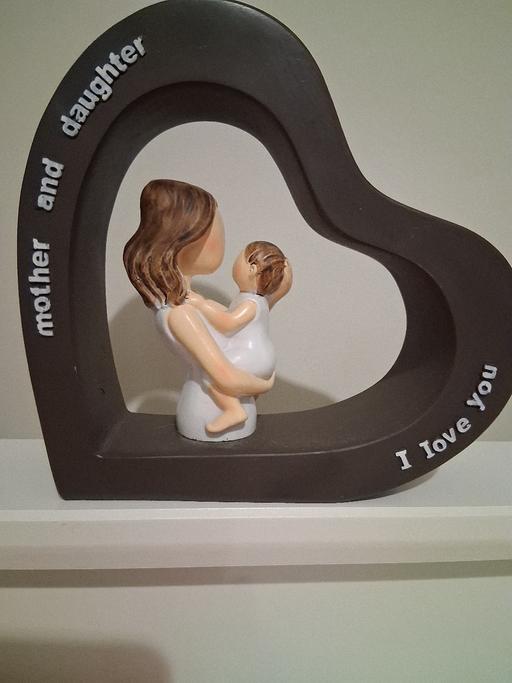  — mother/daughter candle holder