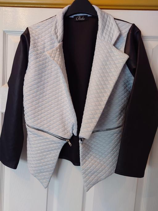  — Women's black/white jacket size 14