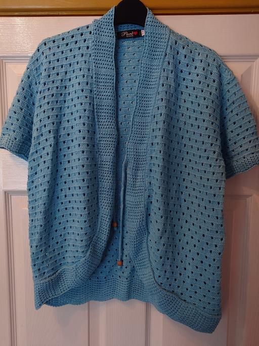  — Women's light blue bolero size M/L