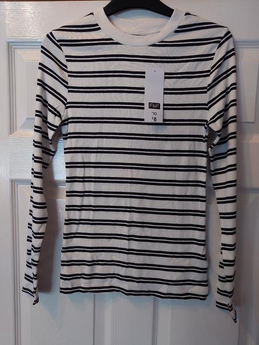  — Women's long sleeved striped top size 8-10