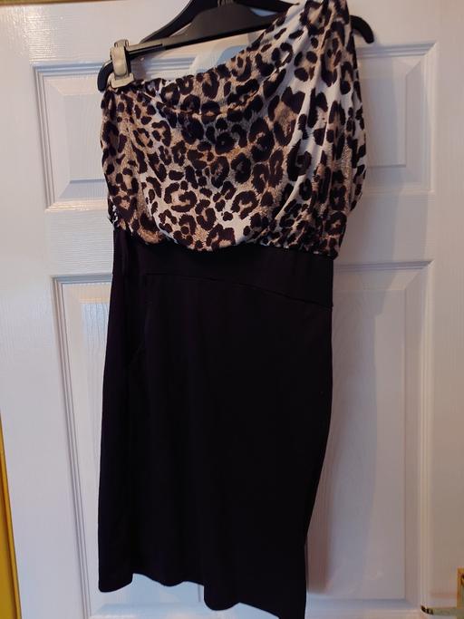 — Women's one shoulder dress size M/L