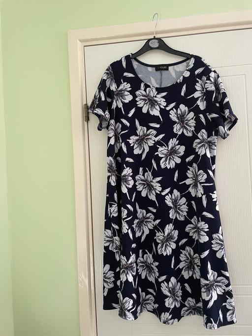  — Black and White Dress with a flower design