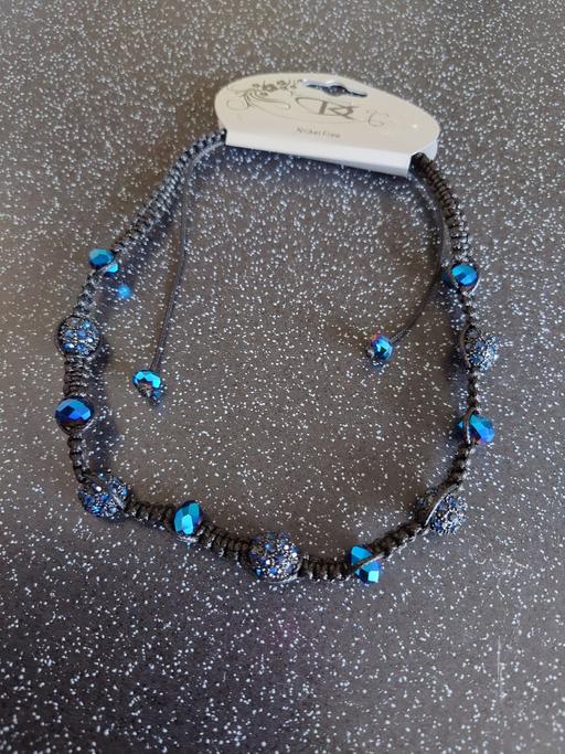  — Women's black/blue shamballa necklace