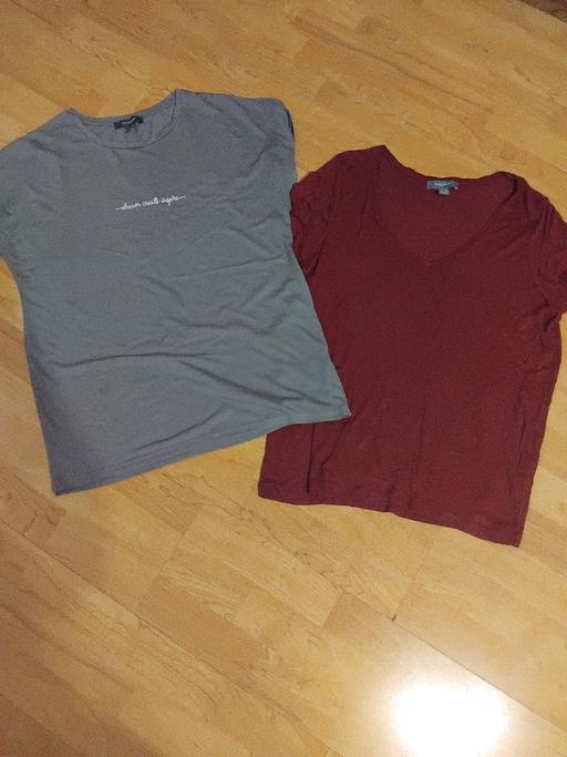  — 2 Tishirts 12/14.