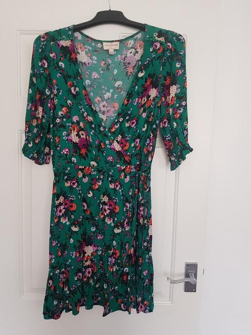  — Green floral dress
