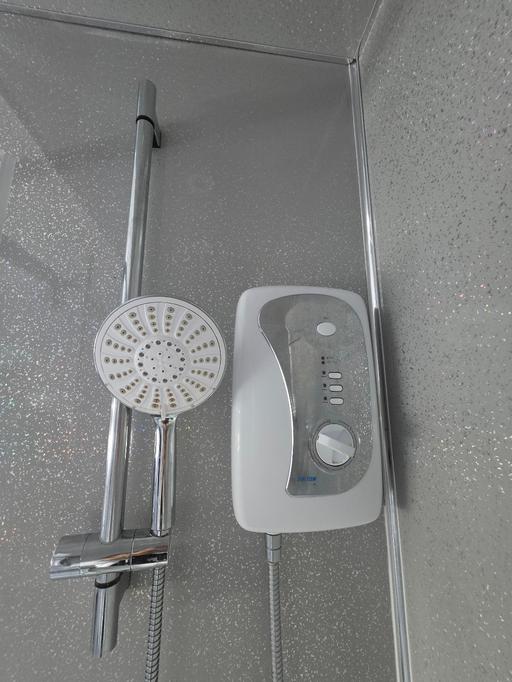  — Triton electrical shower head