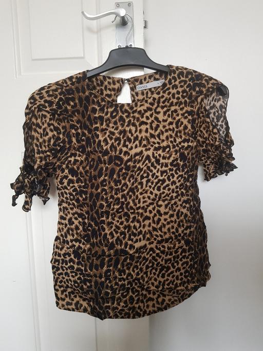  — Oasis animal print top