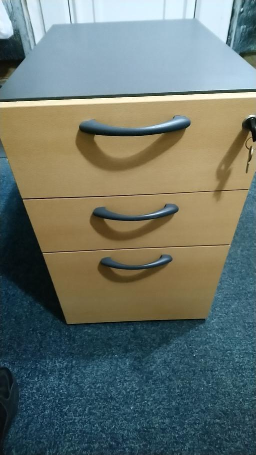  — Filing Cabinet