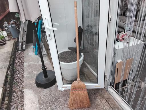  — traditional straw broom cool display