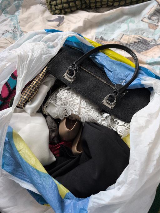  — Bag of random wear size around 8-10 