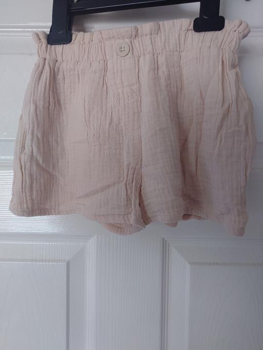  — Girls cream shorts size 3-4 years