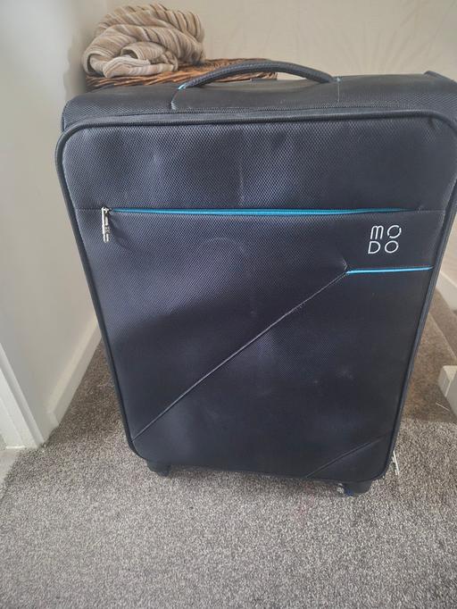  — soft-shell suitcase in black with blue zipper