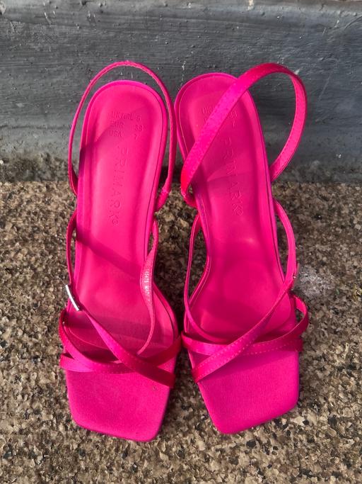  — Pink high heels