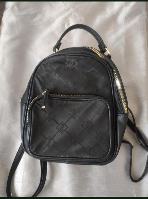  — Small backpack bag