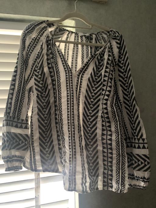  — Woman’s top