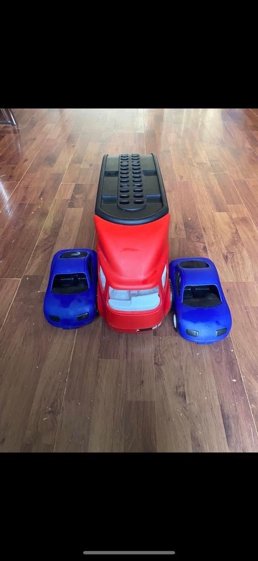  — Large Toy Truck with 2 Blue Cars