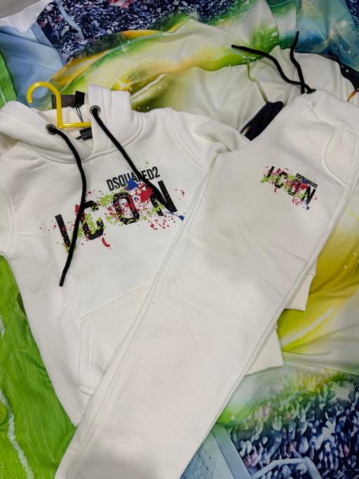  — Tracksuit