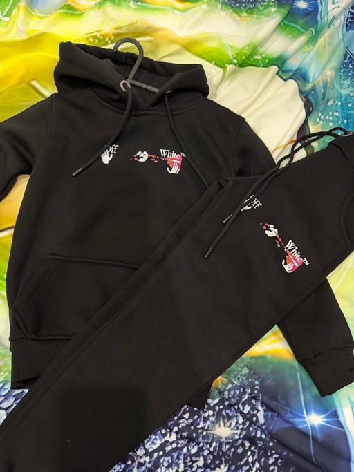  — Tracksuit