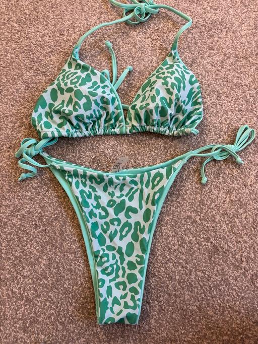  — Green and white animal print bikini