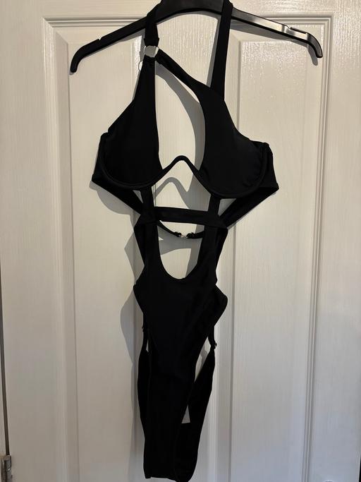  — Black swim suit