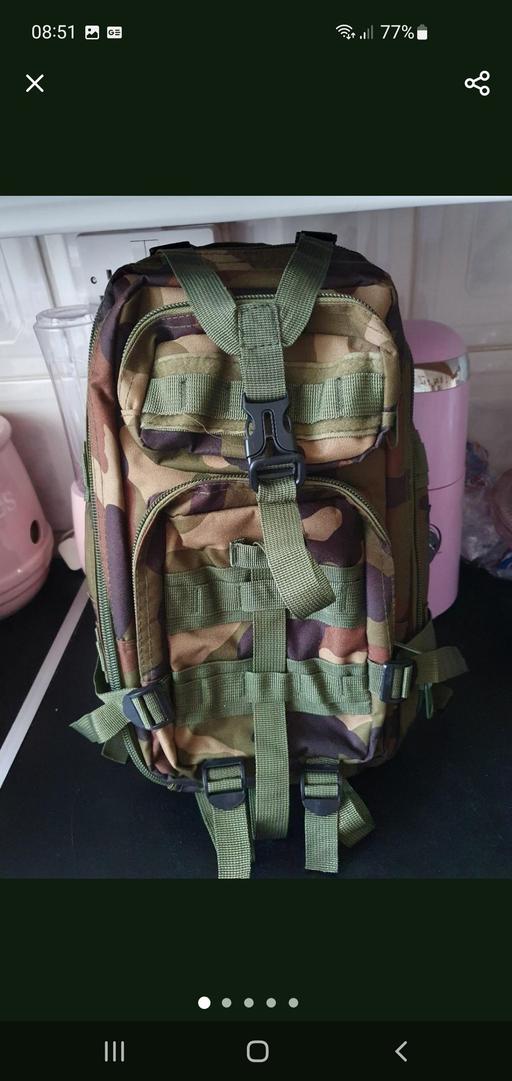  — camouflage green rucksack