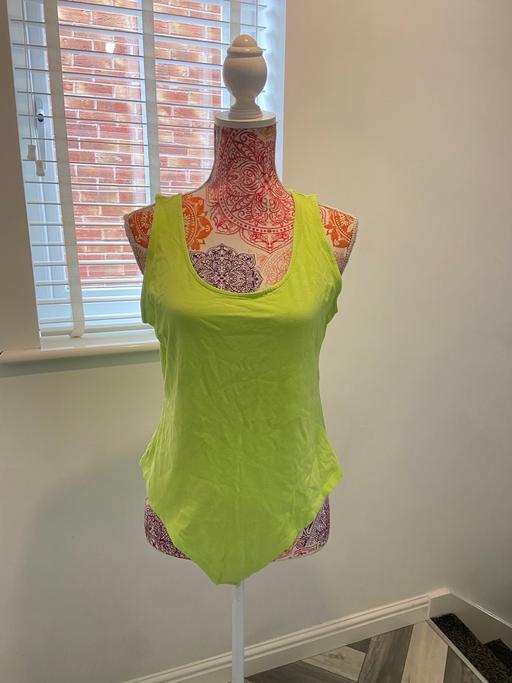 — (18) BODYSUIT £1