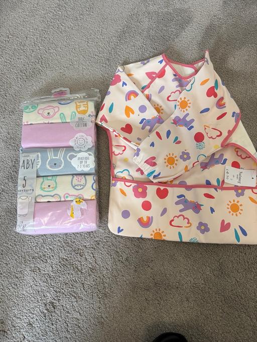  — baby body suit