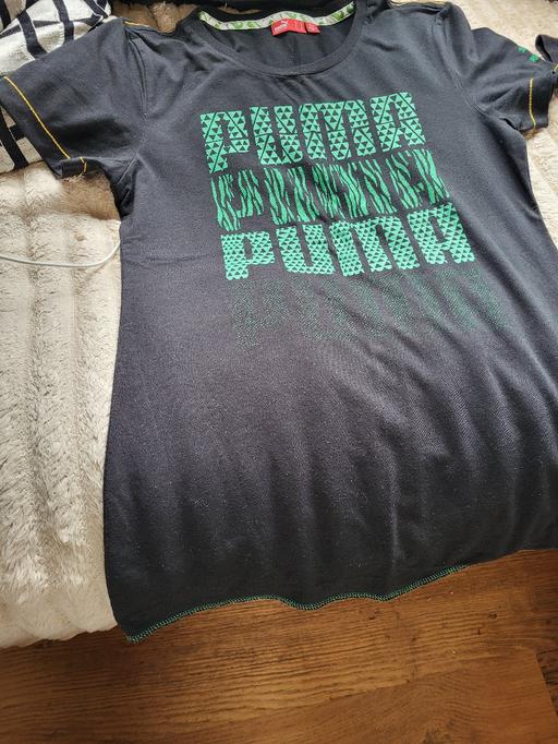 — puma top  size 12