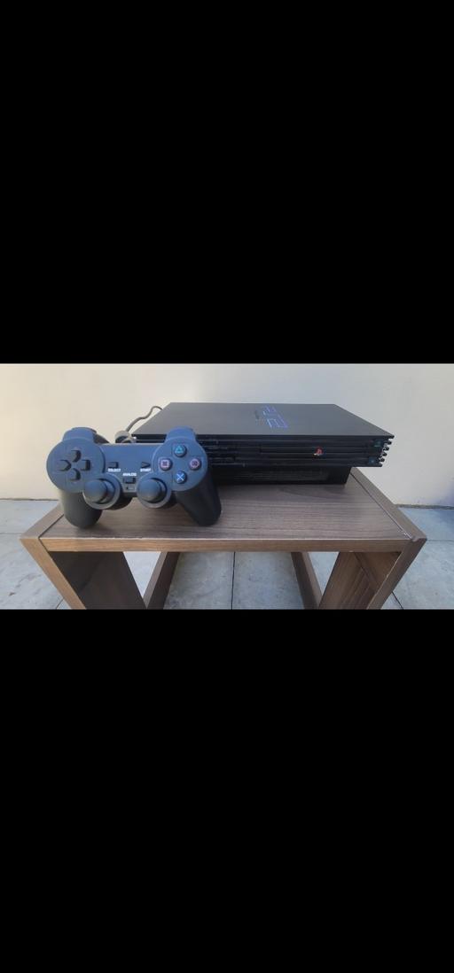  — 🎮 PlayStation Console with Games 🎮