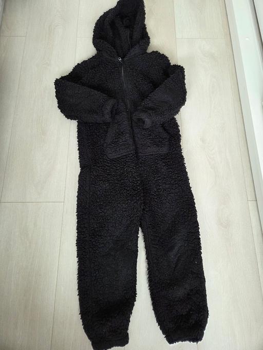  — Age 6-7 TU black onesie
