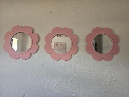  — three pink wall mirrors